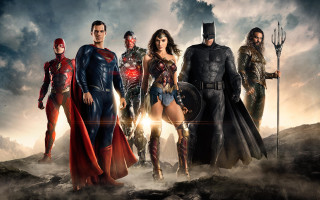 Superheroes group clouds man woman - a group of superheros free wallpaper