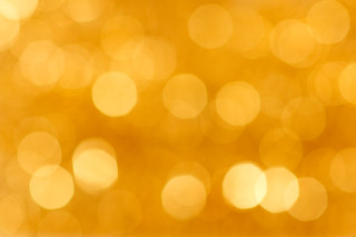 Blurry yellow background circles of - light in the middle free wallpaper