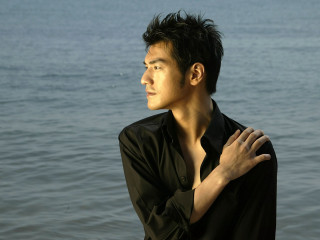 Man standing water hands chest - his shirt free wallpaper