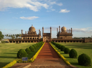 Large building walkway bushes blue - a long walkway free wallpaper