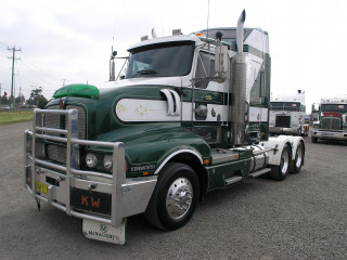 Green semi truck gravel road - a gravel road next free wallpaper