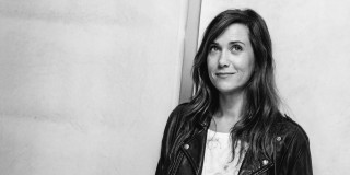 Woman leather jacket smiling wall - christen dalsgaard free wallpaper