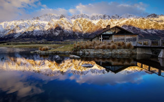 House lake mountains blue sky - the shore of a lake free wallpaper