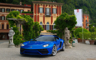 Blue sports car building statue - scenery free wallpaper