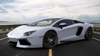 White sports car parking lot 29 - a parking lot next free wallpaper