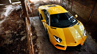 Yellow sports car garage building 2 - a window open free wallpaper