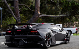 Black sports car parked road 4 - farid mansour free wallpaper