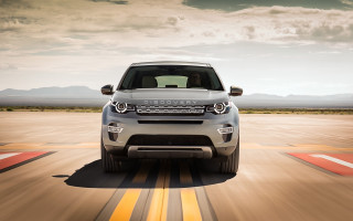 Silver car driving mountains clouds - a silver car free wallpaper