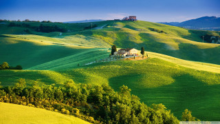 Green hillside house trees foreground - a green hillside free wallpaper
