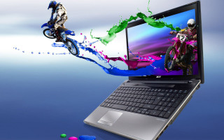 Laptop colorful motorcyclist image background - the screen free wallpaper
