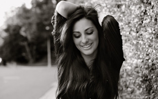 Woman long hair posing bush - a car free wallpaper