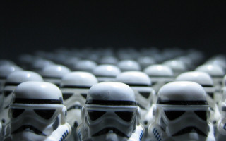 Star wars helmets row table - a table in a room free wallpaper