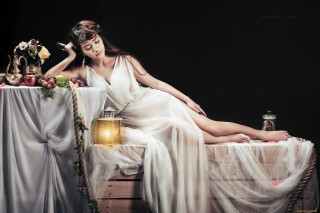 Woman white dress sitting bed 9 - a lantern free wallpaper