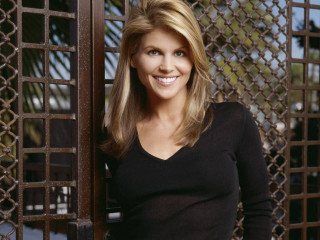 Woman standing gate smiling camera - dorothy hood free wallpaper