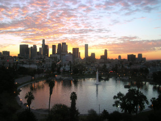 City skyline lake palm trees - free sunset wallpaper for desktop
