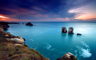 Water rocks sunset sky clouds 2 - a sunset free wallpaper