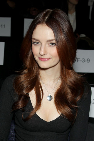 Woman smiling longhair blackshirt necklace - a necklace free wallpaper