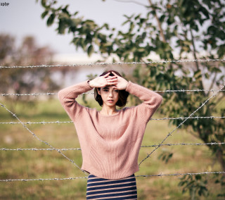 Pink sweater barbed wire blurry - wire fence free wallpaper