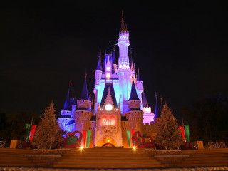 Castle lit up night clock - a castle free wallpaper