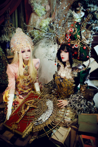 Women elaborate clothing table christmas - two woman free wallpaper