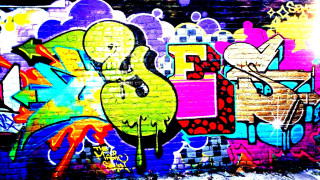 Graffiti wall clock building background - side and a building in the background free wallpaper