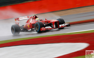 Red race car track smoke - a red race car free wallpaper