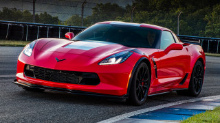 Red sports car racing track - in the foreground free wallpaper