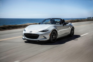 White sports car ocean cliff 2 - panfuturism free wallpaper for desktop