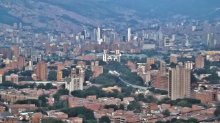 City tall buildings mountain background - panoramic free wallpaper for desktop