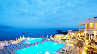 Ocean view night pool cityscape - a view of the ocean free wallpaper