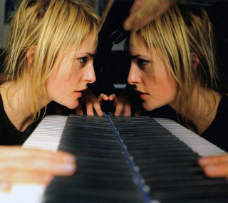 Two women looking piano keyboard - stuckism free wallpaper