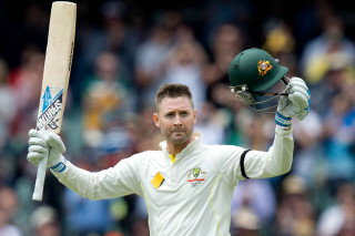 Man holding cricket bat helmet 3 - heroic free wallpaper