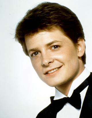 Man tuxedo smiling white background - a man in a tuxedo free wallpaper