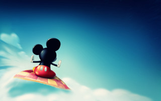 Mickey flying heart tail beach - a blue sky background free wallpaper