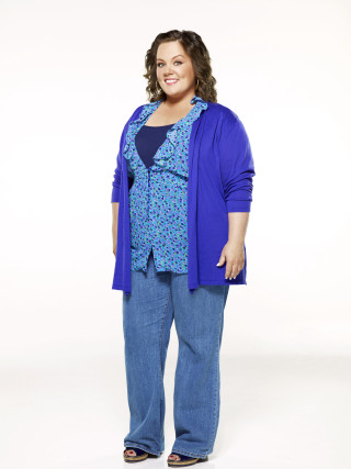 Woman blue hands pockets smiling - dorothy coke free wallpaper