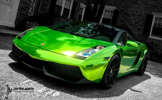 Green sports car brick building - a green sports car free wallpaper
