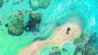 Beach person water rocks formation - rock free wallpaper