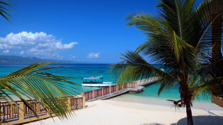 Tropical beach boat palm trees - a tropical beach free wallpaper