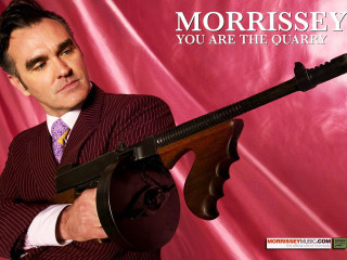 Man suit gun pink background - a man in a suit holding free wallpaper