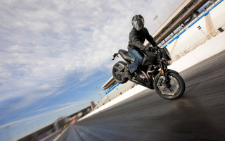 Man motorcycle riding cloudy sky - eric dinyer free wallpaper
