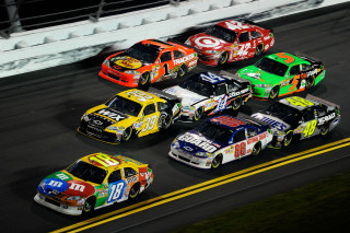 Cars racing track white fence - a group of cars free wallpaper