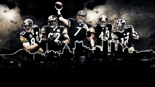 Football players city skyline dark - a group of football players free wallpaper