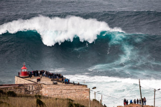 Large wave crashing lighthouse ocean - the cliff free wallpaper