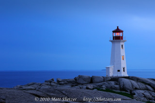Lighthouse rocky shore ocean night - a rocky shore free wallpaper