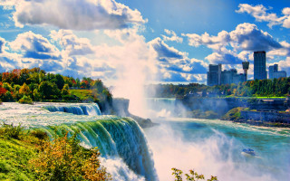 Waterfall boat city river background - a waterfall in the background free wallpaper