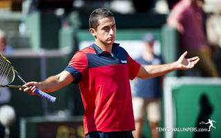 Man holding tennis racquet court 12 - david lazar free wallpaper