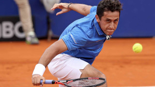 Man playing tennis clay court - ignacio fernandez rio free wallpaper