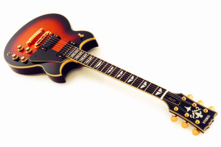Black guitar gold trimmings neck - a black body free wallpaper