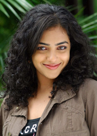 Smiling woman green background palm - movie still frame free wallpaper