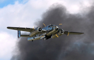 Blue silver plane flying black - dieselpunk free wallpaper